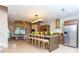 Modern kitchen with stainless steel appliances and an island at 7527 Brooklyn Dr # 7527, Kissimmee, FL 34747