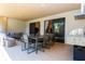 Large covered patio with dining and seating areas at 7527 Brooklyn Dr # 7527, Kissimmee, FL 34747