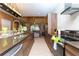 Modern kitchen with stainless steel appliances and an eat-in island at 7527 Brooklyn Dr # 7527, Kissimmee, FL 34747