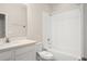 Clean bathroom with white tile and bathtub at 2424 Lobelia Dr, Lake Mary, FL 32746