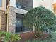 Exterior view of patio and landscaping at 8020 Tuscany Way # 6103, Davenport, FL 33896