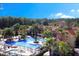 Aerial view of community pool and clubhouse at 8020 Tuscany Way # 6103, Davenport, FL 33896
