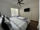 Bright bedroom with a king-size bed and large window at 8020 Tuscany Way # 6103, Davenport, FL 33896