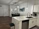 Open concept kitchen and dining area with modern finishes at 8020 Tuscany Way # 6103, Davenport, FL 33896