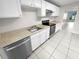 Kitchen with white cabinets, stainless steel appliances at 220 Cherokee Ct # 107, Altamonte Springs, FL 32701