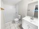 Clean bathroom with white vanity, toilet and shower at 220 Cherokee Ct # 107, Altamonte Springs, FL 32701