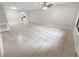 Spacious living room with tile flooring and ceiling fan at 220 Cherokee Ct # 107, Altamonte Springs, FL 32701