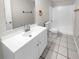 Clean bathroom with white vanity and shower/tub combo at 220 Cherokee Ct # 107, Altamonte Springs, FL 32701