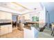 Kitchen features granite countertops and a breakfast bar with seating at 5924 White Egret Ln, Orlando, FL 32810