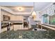 Modern kitchen with granite countertops and stainless steel appliances at 5924 White Egret Ln, Orlando, FL 32810