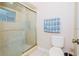 Small bathroom with shower and toilet at 5924 White Egret Ln, Orlando, FL 32810