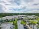 Aerial view of community clubhouse and parking at 2476 Pine Preserve Ct, St Cloud, FL 34771