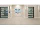 Hallway with access to community rooms and storage at 2476 Pine Preserve Ct, St Cloud, FL 34771