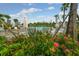 Resort-style pool with lounge chairs and lush landscaping at 2476 Pine Preserve Ct, St Cloud, FL 34771