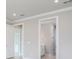Spacious bedroom with access to en-suite bathroom at 2476 Pine Preserve Ct, St Cloud, FL 34771
