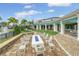 Community fire pit with seating at 2476 Pine Preserve Ct, St Cloud, FL 34771