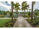 Pathway to the community pool area at 2476 Pine Preserve Ct, St Cloud, FL 34771