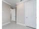 Spacious bedroom with neutral walls and white doors at 2476 Pine Preserve Ct, St Cloud, FL 34771