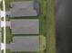 Three houses next to each other, grey roofs, and one with a pool at 2476 Pine Preserve Ct, St Cloud, FL 34771
