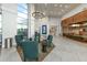 Elegant clubhouse lobby featuring comfortable seating areas at 2476 Pine Preserve Ct, St Cloud, FL 34771