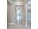 Bright hallway with neutral walls and tile flooring at 2476 Pine Preserve Ct, Saint Cloud, FL 34771