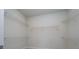 Walk-in closet with wire shelving at 2476 Pine Preserve Ct, St Cloud, FL 34771
