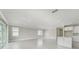 Open concept living area with access to patio at 2476 Pine Preserve Ct, St Cloud, FL 34771
