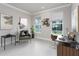 Home office with window, desk, chair, and decor at 2476 Pine Preserve Ct, St Cloud, FL 34771