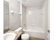 Neat bathroom with a bathtub and granite countertop at 1078 Osprey Cove Cir, Groveland, FL 34736