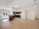 Modern kitchen with dark brown cabinets and stainless steel appliances at 1078 Osprey Cove Cir, Groveland, FL 34736