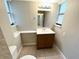 Clean bathroom with single vanity and tiled floor at 7817 Satsuma Ct, Orlando, FL 32835