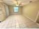 Simple dining room with tile flooring and lots of natural light at 7817 Satsuma Ct, Orlando, FL 32835