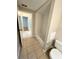 Simple bathroom with shower/tub combo and tiled floor at 7817 Satsuma Ct, Orlando, FL 32835