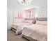 Charming bedroom with two twin beds and princess theme at 2031 Lelani Cir, Davenport, FL 33897