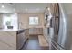 Modern kitchen with stainless steel appliances and quartz countertops at 14007 Creek Harbor Dr, Orlando, FL 32824