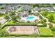 Community pool and playground are shown in this aerial view at 14007 Creek Harbor Dr, Orlando, FL 32824