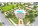 Community pool and clubhouse, seen from above at 14007 Creek Harbor Dr, Orlando, FL 32824