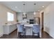 Modern kitchen with gray cabinets, quartz countertops, and stainless steel appliances at 14007 Creek Harbor Dr, Orlando, FL 32824
