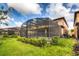 Two-story house with a private pool and screened enclosure at 8804 Macapa Dr, Kissimmee, FL 34747