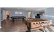 Game room with a pool table and foosball table at 8804 Macapa Dr, Kissimmee, FL 34747