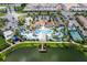 Large community pool with water features at 8804 Macapa Dr, Kissimmee, FL 34747