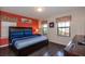 Spacious bedroom with king-size bed and large windows at 8804 Macapa Dr, Kissimmee, FL 34747