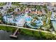 Resort-style pool with water features, playground, and clubhouse at 8804 Macapa Dr, Kissimmee, FL 34747