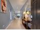 Bright entryway with tile floors and a console table at 8804 Macapa Dr, Kissimmee, FL 34747