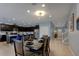 Modern kitchen with dark cabinets and granite countertops at 8804 Macapa Dr, Kissimmee, FL 34747