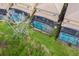 Aerial view of houses with screened pools at 8804 Macapa Dr, Kissimmee, FL 34747