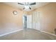 Well-lit bedroom featuring a ceiling fan and closet at 406 Beth Dr, Sanford, FL 32771