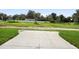 Vacant lot with a view of surrounding homes and vegetation at 1012 S Holly Ave, Sanford, FL 32771