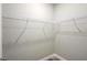 Walk-in closet with wire shelving, providing ample storage space at 1012 S Holly Ave, Sanford, FL 32771