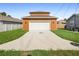 New construction home with a two-car garage and driveway at 1012 S Holly Ave, Sanford, FL 32771